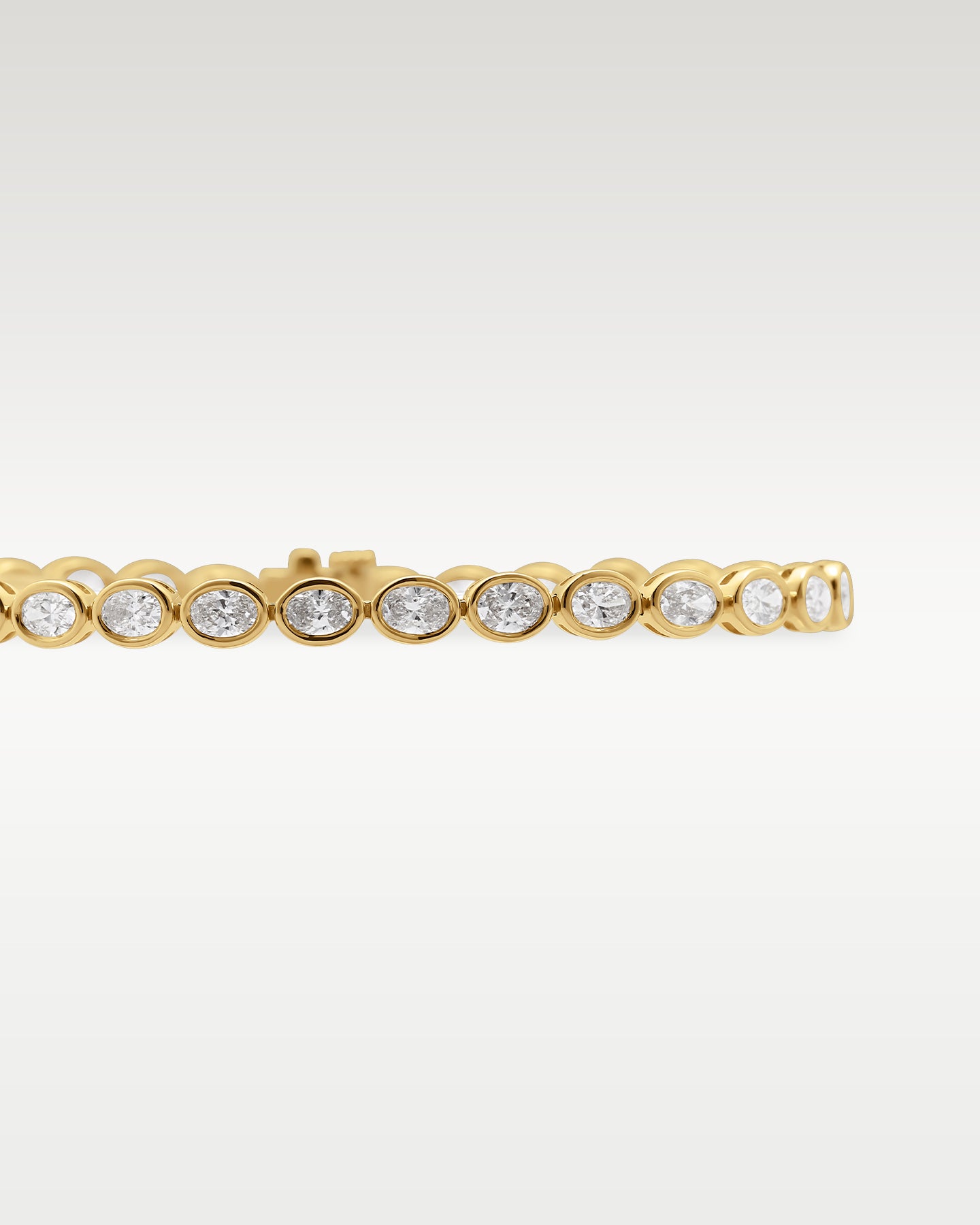 18K Gold Bezel Oval Diamond Tennis Bracelet | Noah's Fine Gold Jewelry TX