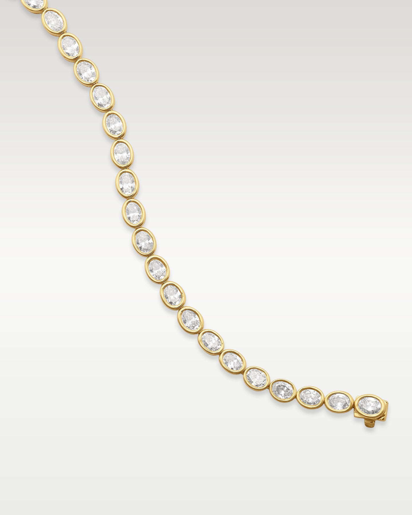 18K Gold Bezel Oval Diamond Tennis Bracelet | Noah's Fine Gold Jewelry TX