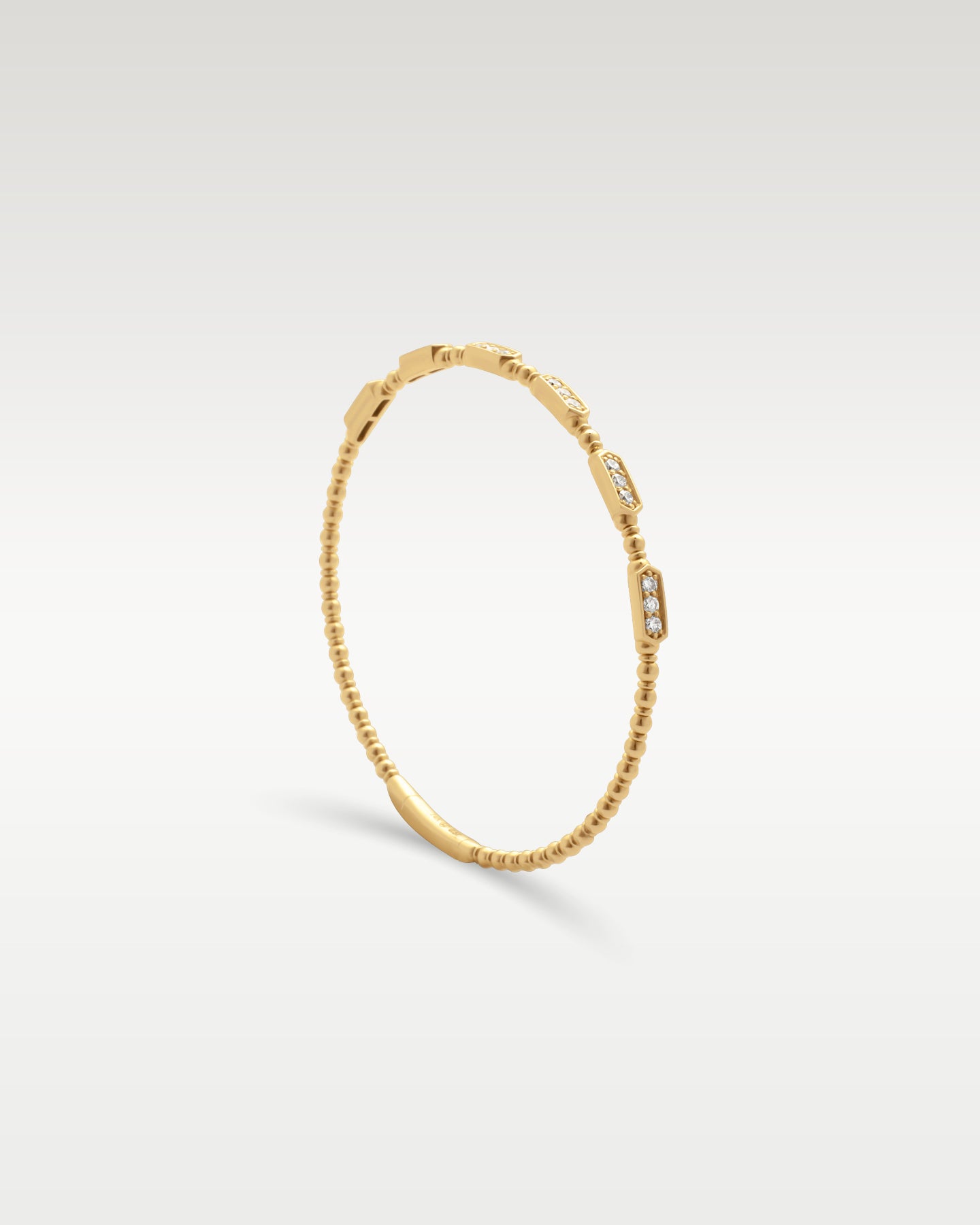 Yellow Gold 0.57 carat Diamond Beaded Bangle | Noah's Fine Jewelry and Watches Dallas