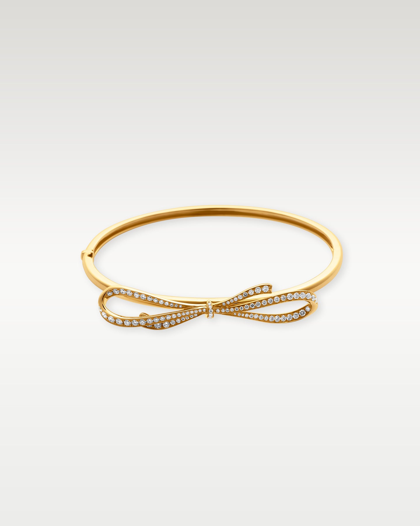 Yellow Gold Diamond Bow Bangle | Noah's Fine Jewelry Frisco, Texas
