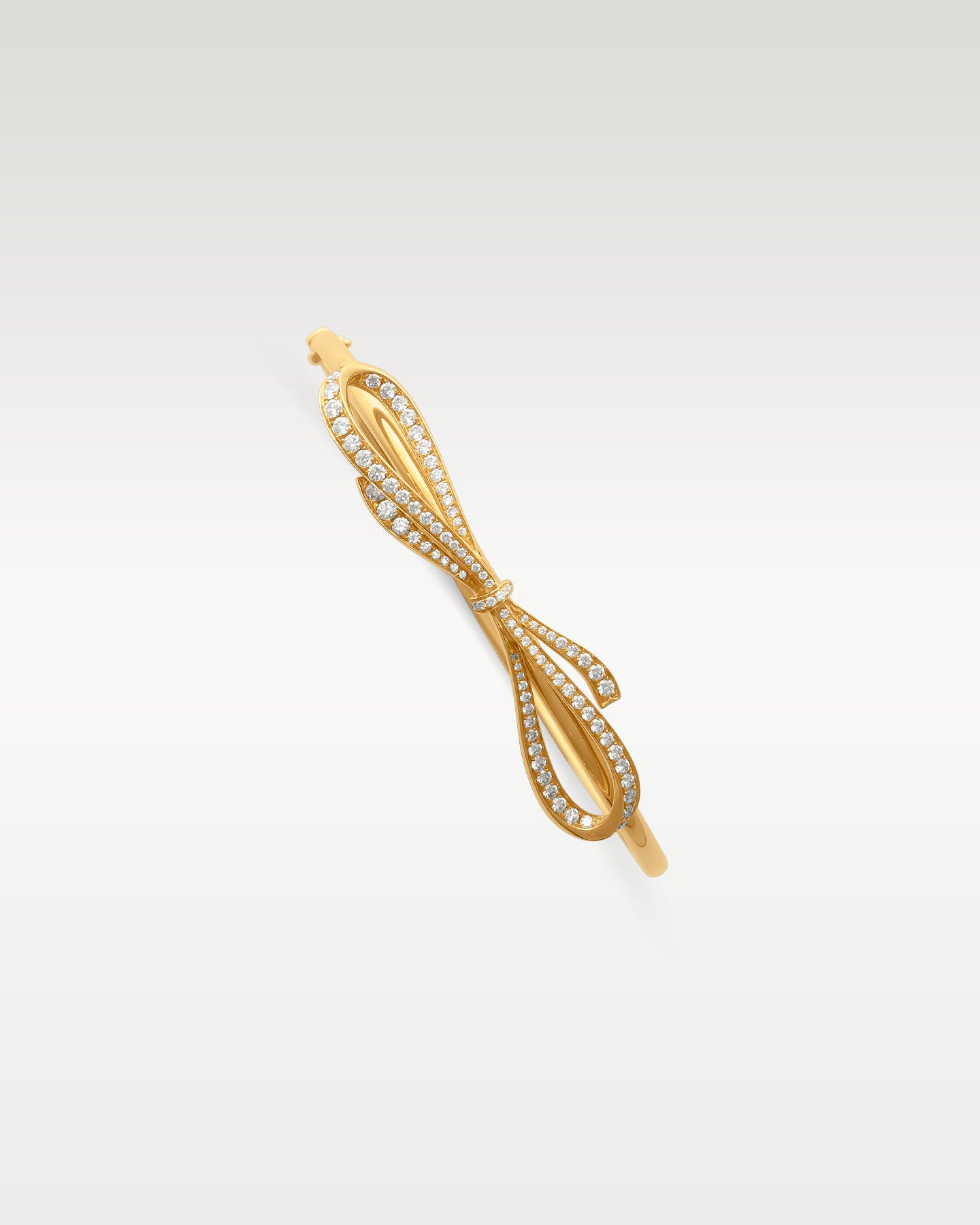 Yellow Gold Diamond Bow Bangle | Noah's Fine Jewelry Frisco, Texas