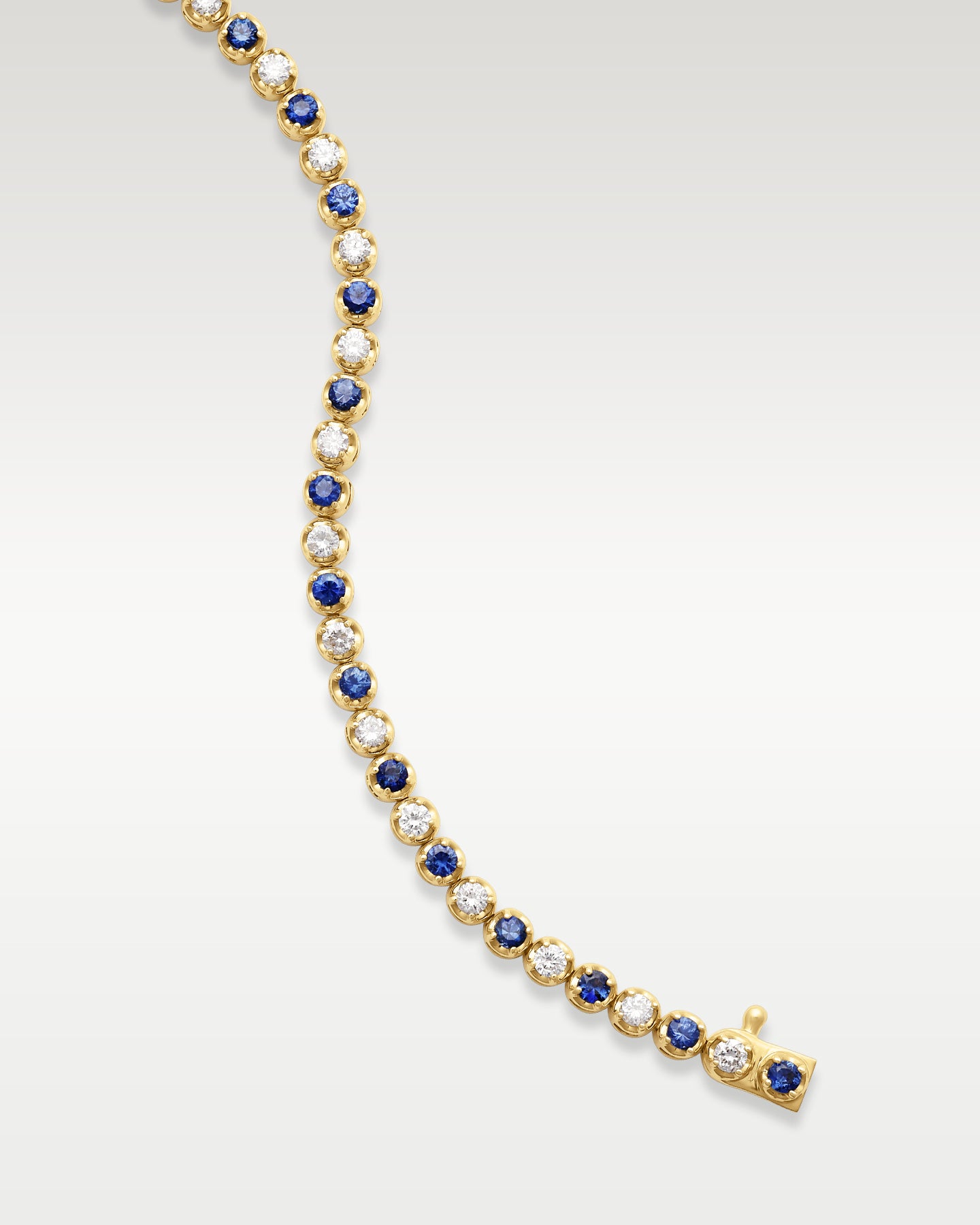 Yellow Gold Sapphire Diamond Tennis Bracelet | Noah's Fine Watches and Jewelry DFW
