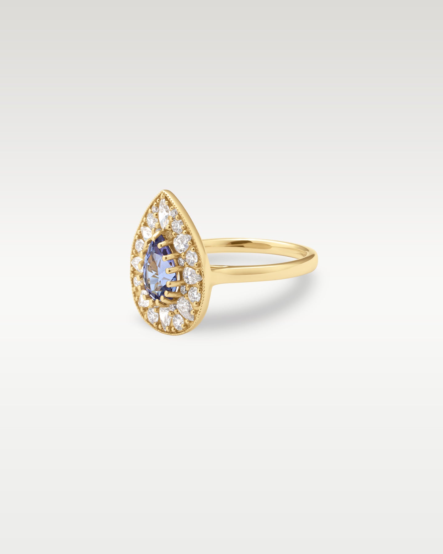 Pear-Shaped Yellow Gold Tanzanite Diamond Ring | Noah's Fine Jewelry Frisco
