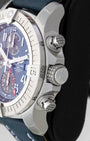 Side profile detail showing the 45mm stainless steel case, knurled screw-down crown, and chronograph pushers on a Breitling Avenger GMT A24315101C1X1