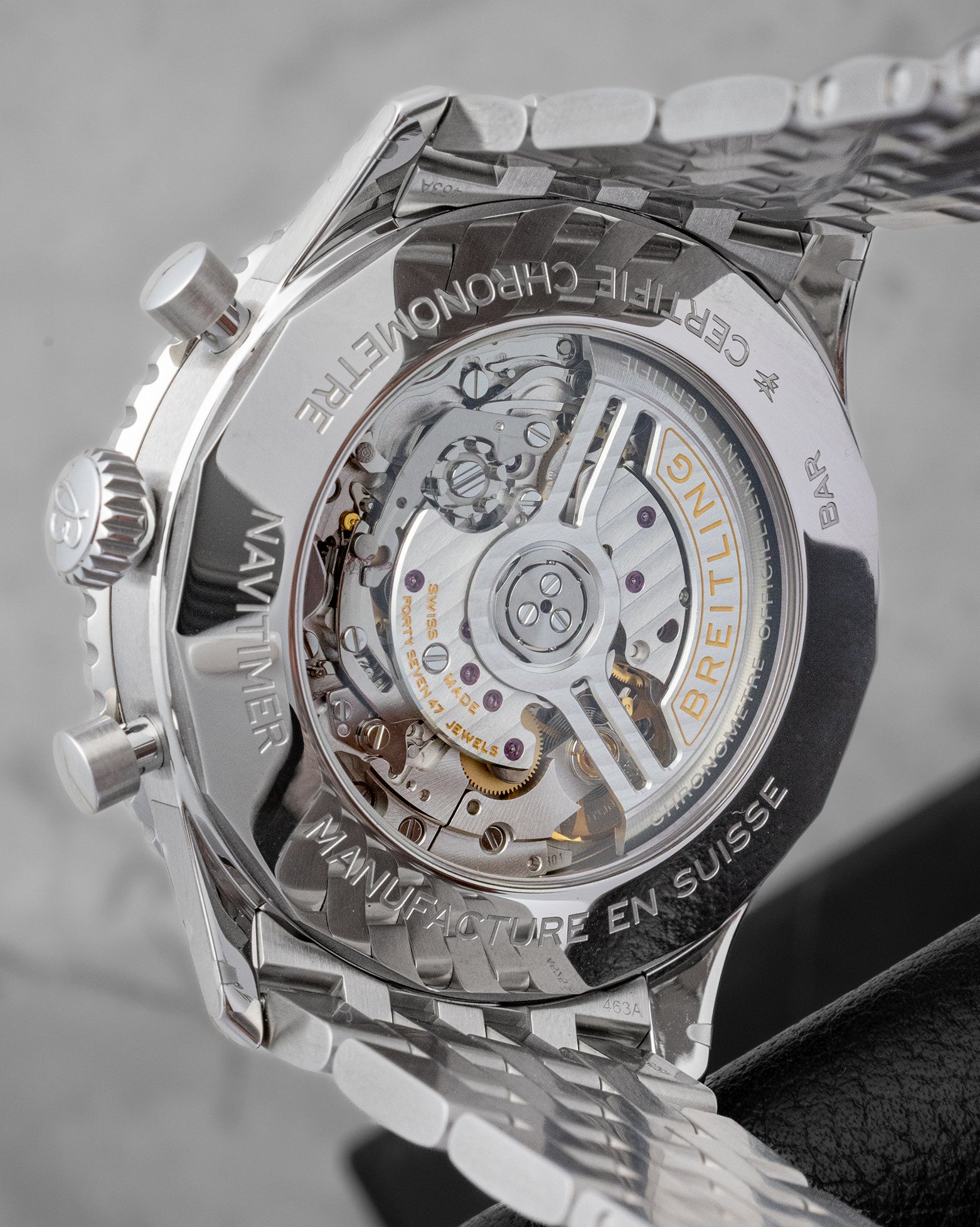The sapphire crystal exhibition caseback of a Breitling Navitimer showcasing the column-wheel Manufacture Caliber B01 automatic movement