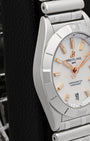 Left-side studio profile view showcasing the fine satin-brushed finish across the watch case band and the clean architectural curve of the lugs
