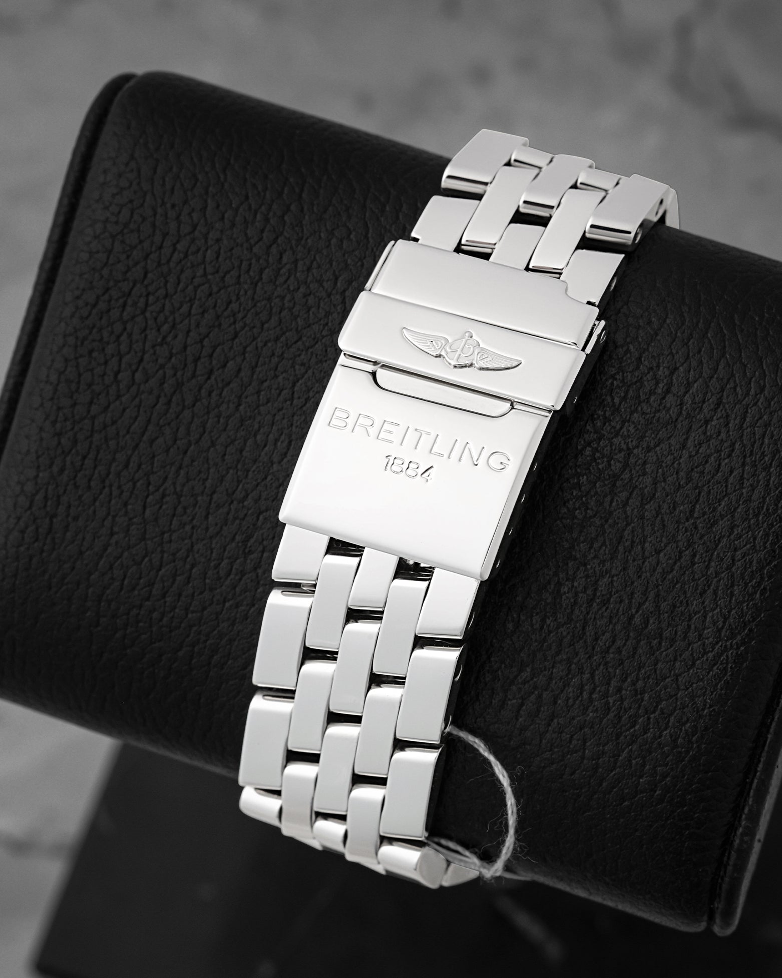 Rear view of the stainless steel Pilot bracelet and folding flip-lock clasp on Breitling Chronomat Evolution A13356