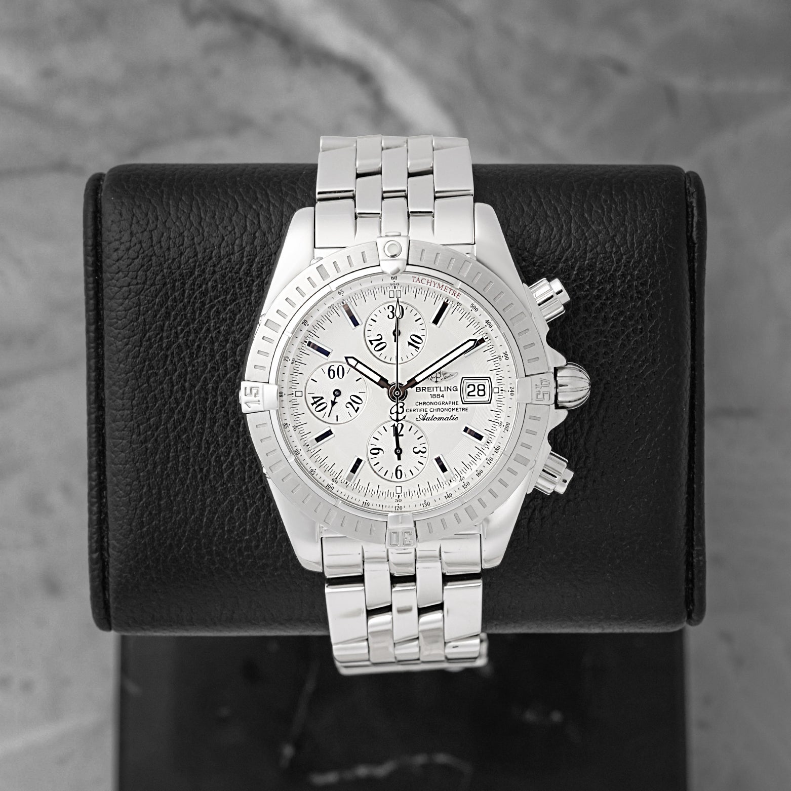 Pre owned Breitling Chronomat Evolution A13356 silver dial stainless steel watch at Noah's Fine Watches & Jewelry in Dallas, TX