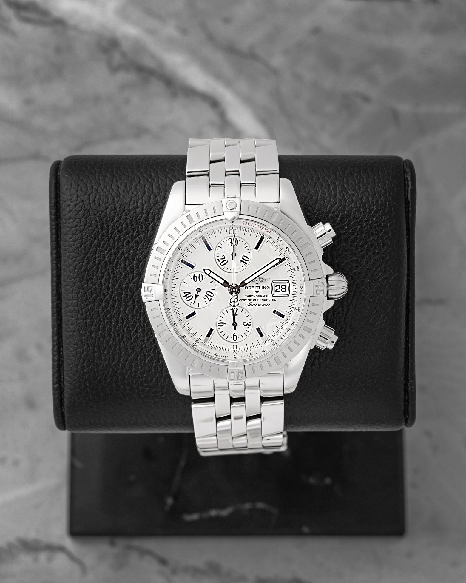 Pre owned Breitling Chronomat Evolution A13356 silver dial stainless steel watch at Noah's Fine Watches & Jewelry in Dallas, TX