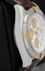Side profile view of the 44mm stainless steel case on a Breitling Chronomat Evolution B13356 chronograph