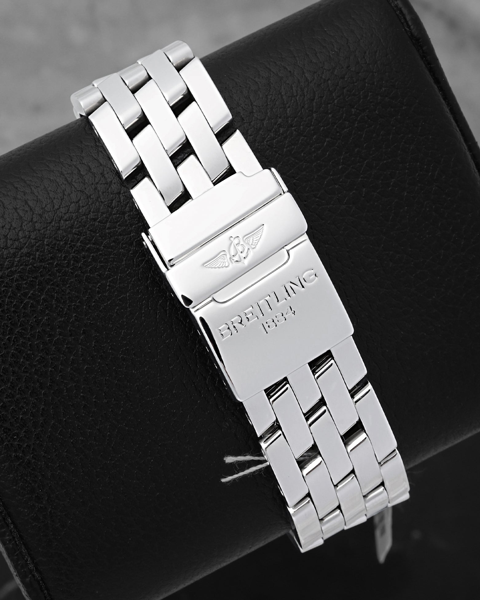 Breitling stainless steel five-row Pilot bracelet and folding deployment clasp with the engraved logo and safety latch