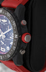 Close-up of the red rubber crown and chronograph pushers on a Breitling Endurance Pro 44