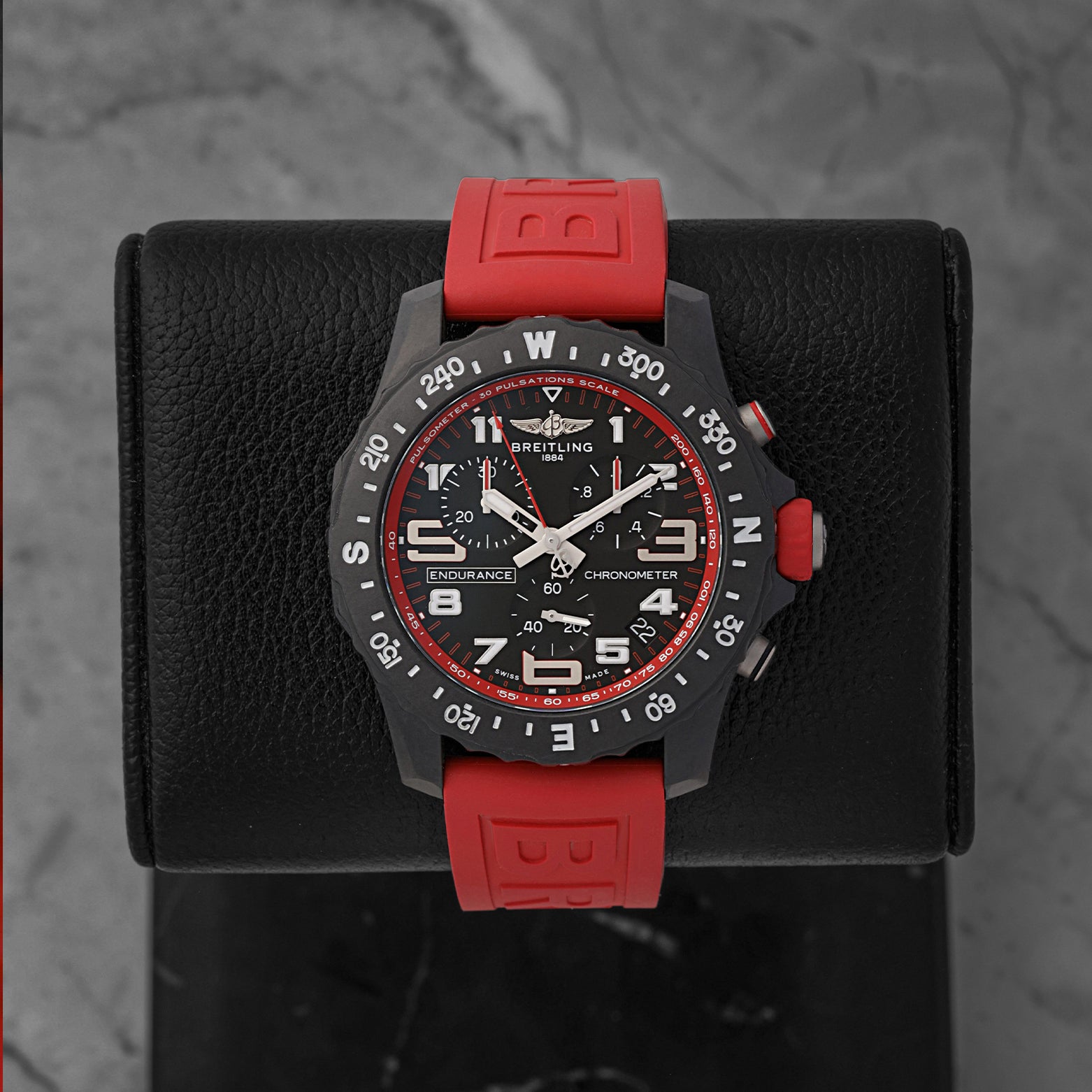 Breitling Endurance Pro 44mm black dial with red rubber strap X82310D91B1S1 at Noah's Fine Watches & Jewelry Dallas