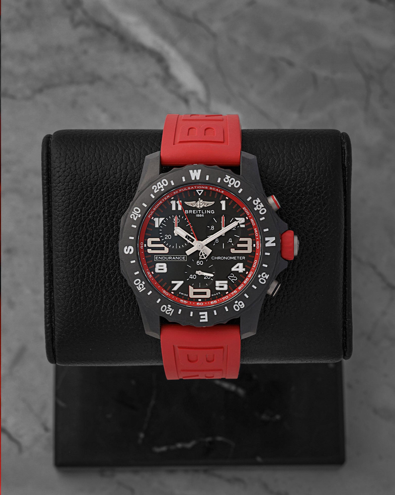 Breitling Endurance Pro 44mm black dial with red rubber strap X82310D91B1S1 at Noah's Fine Watches & Jewelry Dallas