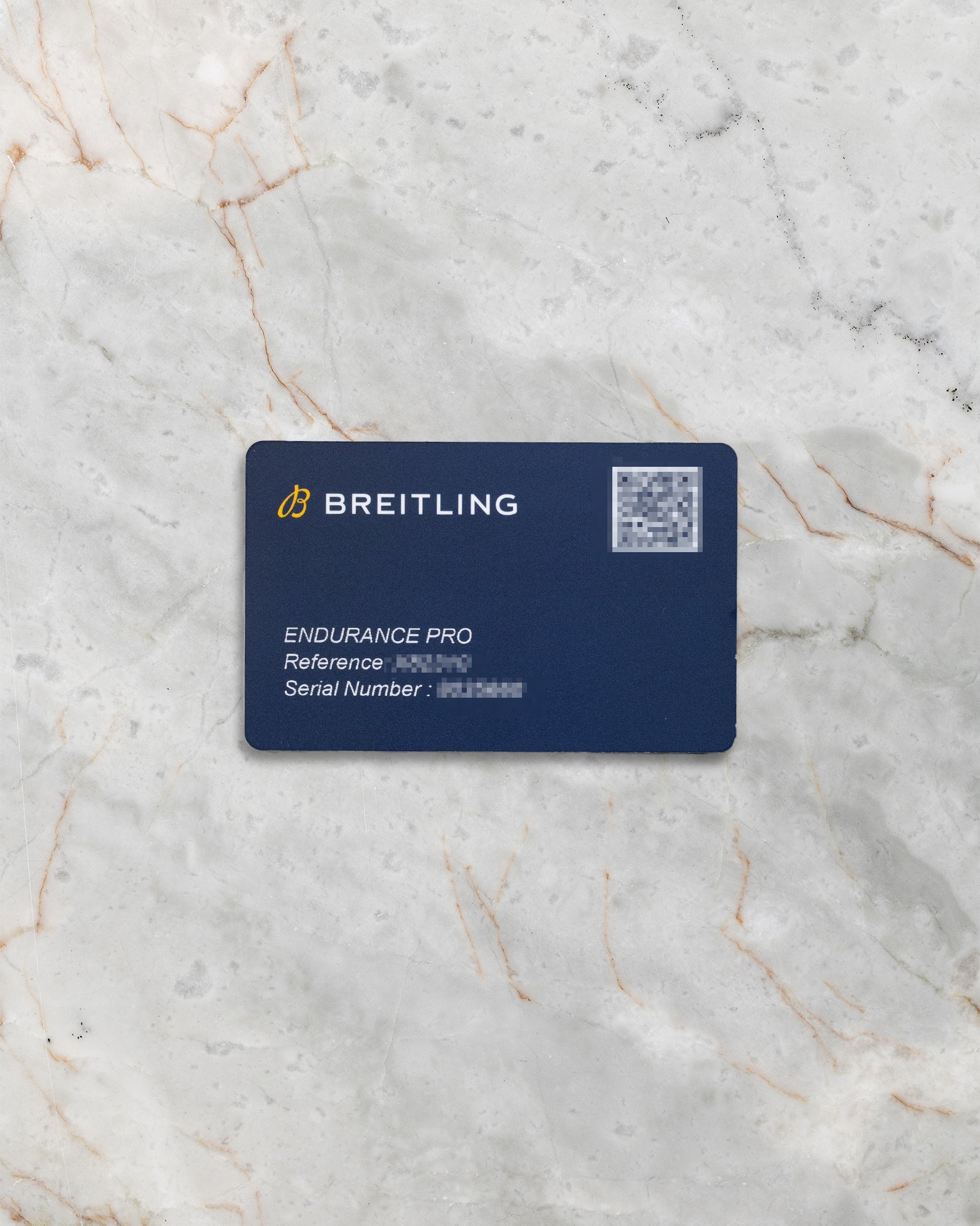 The official blue Breitling electronic international warranty card with QR code, confirming product authenticity at Noahs Fine Watches and Jewelry Dallas