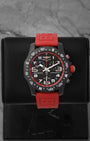 Front portrait of a pre-owned Breitling Endurance Pro 44 Ref X82310D91B1S1 featuring a black Breitlight case and red rubber strap, available at Noahs Fine Watches and Jewelry Dallas