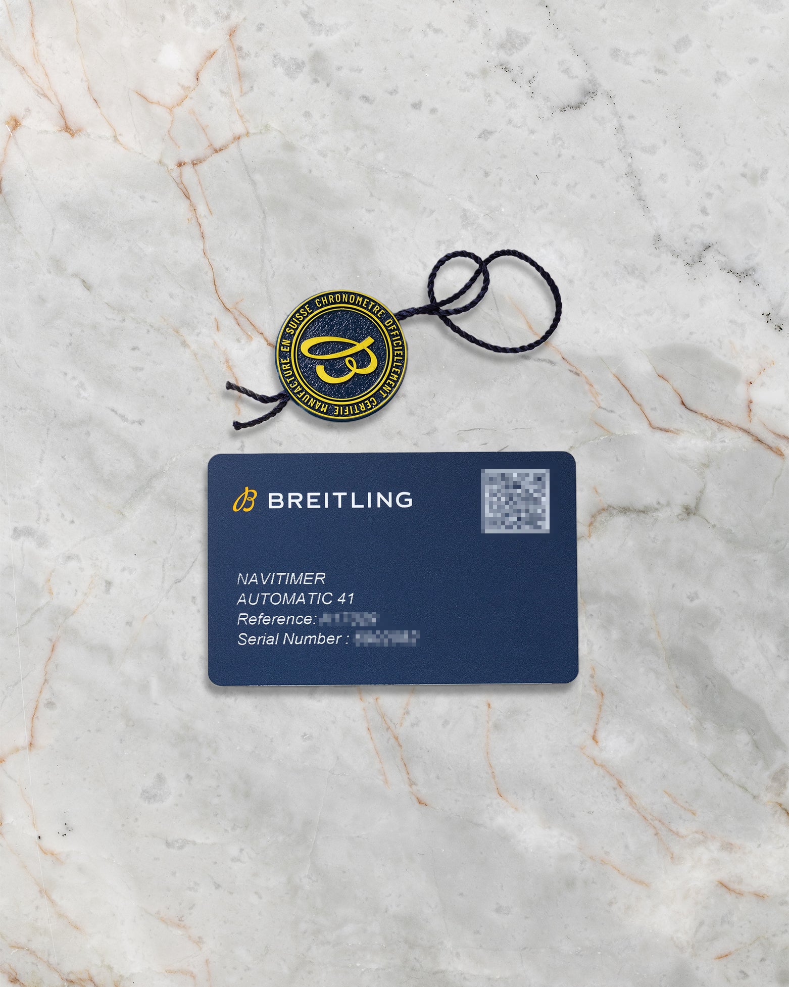 Official Breitling digital warranty card and round logo hang tag for Navitimer Automatic 41 reference A17329
