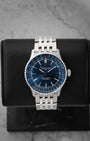 Pre owned Breitling Navitimer Automatic 41mm reference A17329 with blue dial and 7-row stainless steel Navitimer bracelet at Noahs Fine Watches and Jewelry in Dallas TX