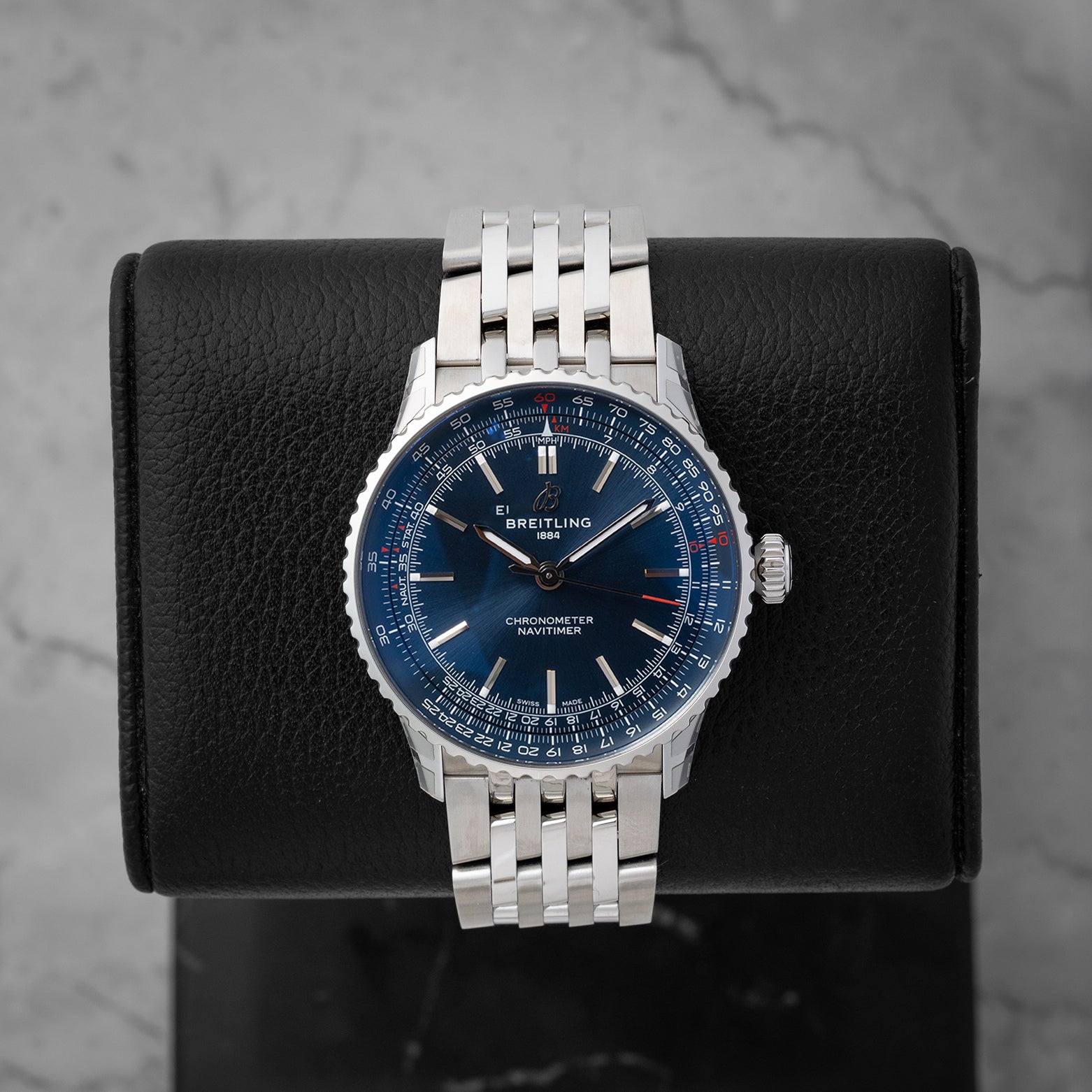 Pre owned Breitling Navitimer Automatic 41mm reference A17329 with blue dial and 7-row stainless steel Navitimer bracelet at Noahs Fine Watches and Jewelry in Dallas TX