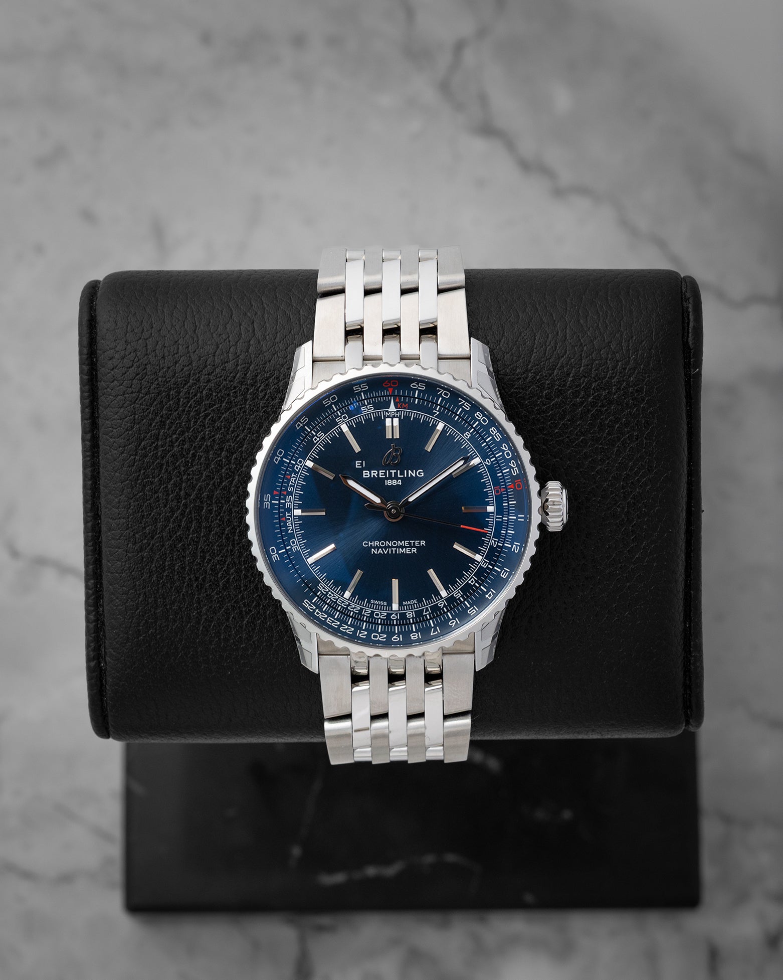 Pre owned Breitling Navitimer Automatic 41mm reference A17329 with blue dial and 7-row stainless steel Navitimer bracelet at Noahs Fine Watches and Jewelry in Dallas TX