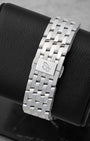 Rear studio view of the iconic 7-row stainless steel Navitimer link bracelet and integrated folding deployment clasp