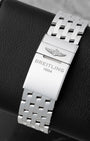 Back view showing the stainless steel Navitimer bracelet with folding clasp engraved with the Breitling 1884 logo