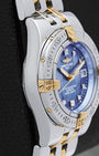 left-side case profile view of a pre-owned steel and 18k yellow gold 30mm ladies Breitling sports watch case resting on a presentation block