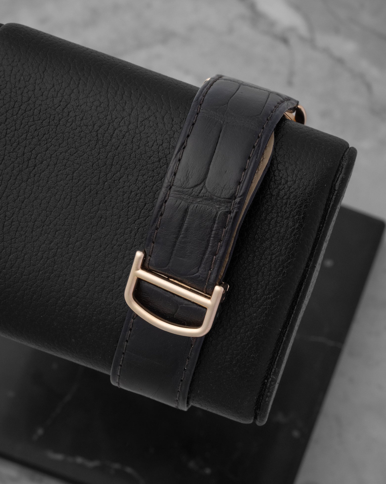 Black alligator leather watch strap with a solid 18k rose gold folding deployment buckle