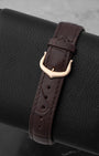 brown alligator leather strap secured by a solid 18k rose gold stylized Ardillon pin buckle on a Cartier watch