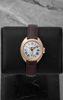 Clé de Cartier 31mm dress watch in 18k rose gold with a silver sunray flinqué dial blue Roman numerals and date winboe