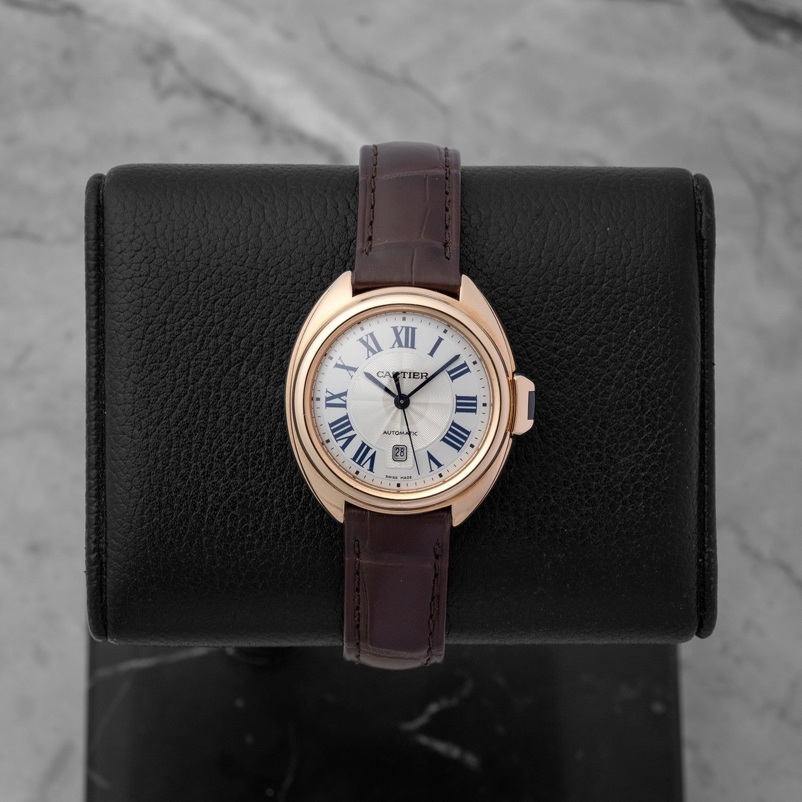 Clé de Cartier 31mm dress watch in 18k rose gold with a silver sunray flinqué dial blue Roman numerals and date winboe