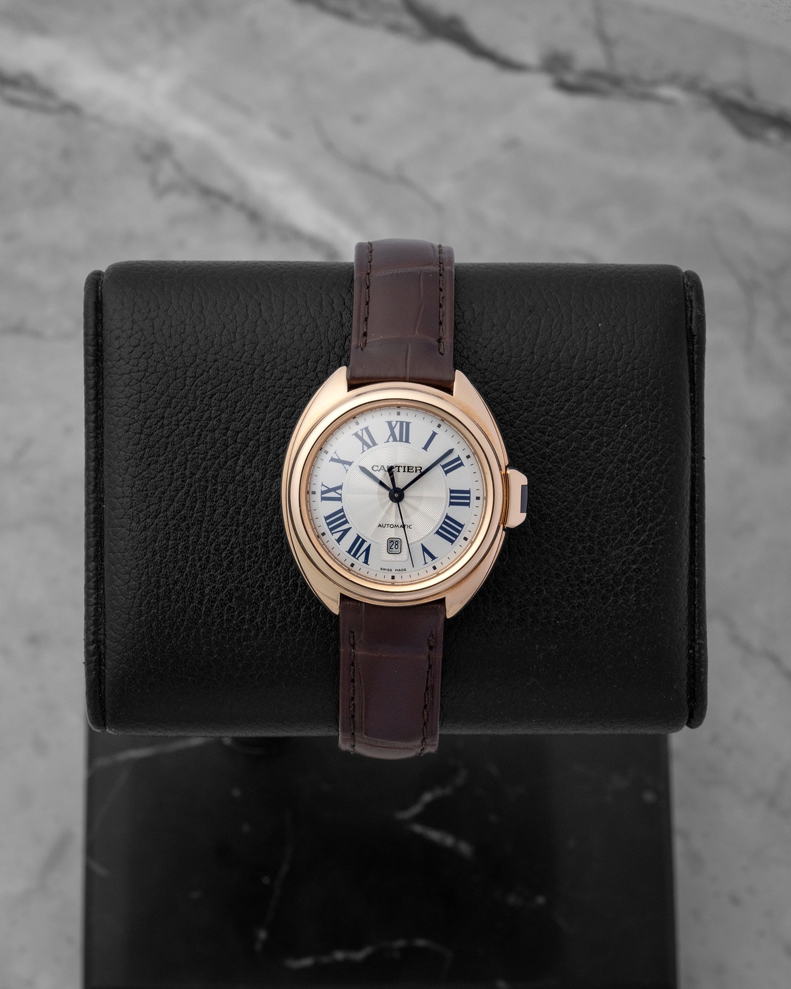 Clé de Cartier 31mm dress watch in 18k rose gold with a silver sunray flinqué dial blue Roman numerals and date winboe