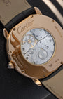 The clear sapphire caseback of a Cartier watch showing the manual-winding calibre 430 MC mechanical movement inside