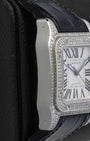 Left side profile view of the square robust pave diamond-set case on a mid-size Cartier Santos 100 automatic watch