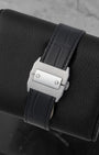 heavy, industrial satin-brushed stainless steel double folding deployment clasp on a black alligator leather Cartier watch strap