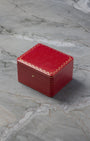 Official red Cartier presentation watch box included with pre-owned Santos de Cartier WSSA0039 at Noah's Fine Watches & Jewelry