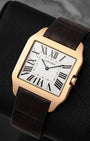 Angled front view of pre-owned Cartier Santos-Dumont reference W2006951 featuring an 18k rose gold bezel, silver dial, and blued-steel hands