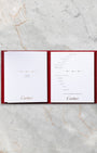 Original Cartier red guarantee certificate booklet included with 2014 Santos-Dumont W2006951 set