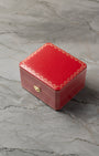 Official red Cartier presentation watch box included with pre-owned Santos-Dumont W2006951 at Noah's Fine Watches & Jewelry