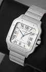 Angled front view of Cartier Santos Large silvered opaline dial with Roman numerals and date at 6 o'clock