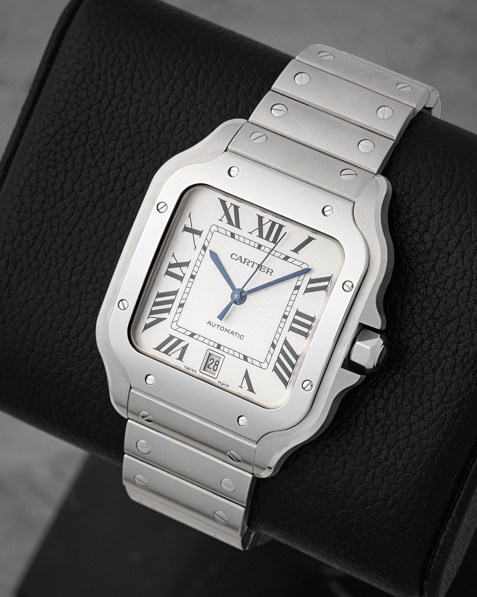 Angled front view of Cartier Santos Large silvered opaline dial with Roman numerals and date at 6 o'clock