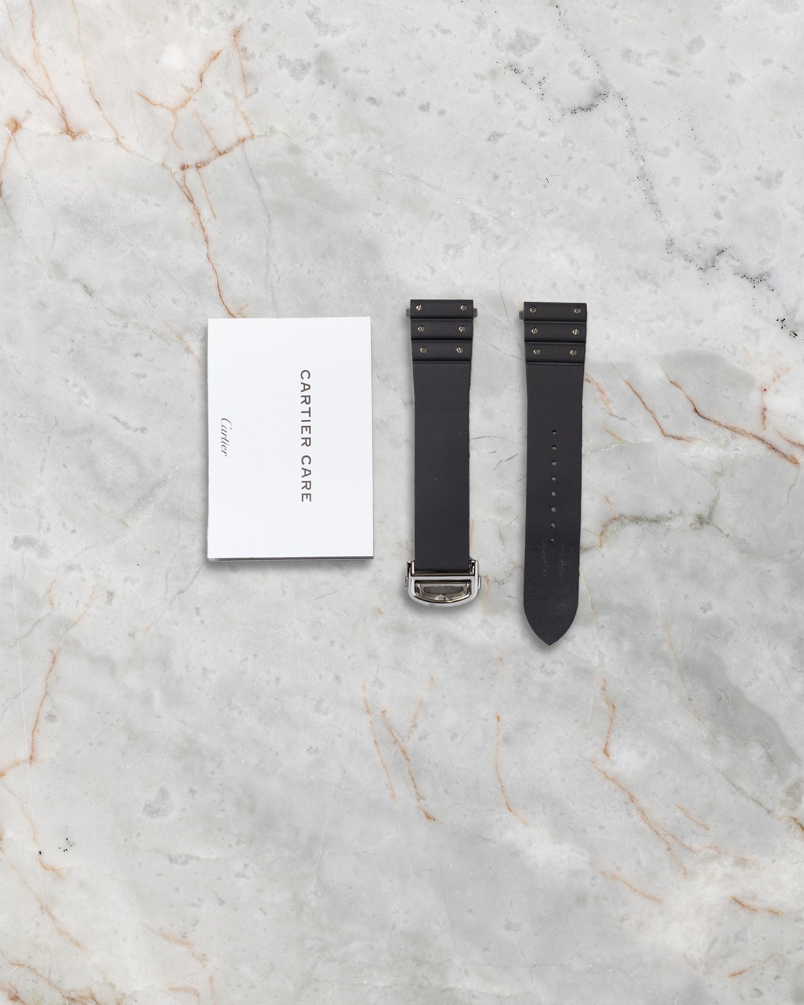 Original Cartier paperwork and extra black leather strap with QuickSwitch system for Santos Skeleton WHSA0015