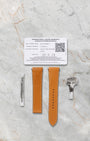 2022 pre-owned Cartier warranty card with QuickSwitch tan calfskin leather strap, folding buckle, and adjustment tool