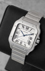 Angled view of pre-owned Cartier Santos de Cartier Large WSSA0018 featuring radial Roman numerals and blued-steel sword hands
