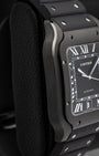 Left side profile view displaying the black ADLC steel case and bezel screws of Cartier Santos de Cartier WSSA0039
