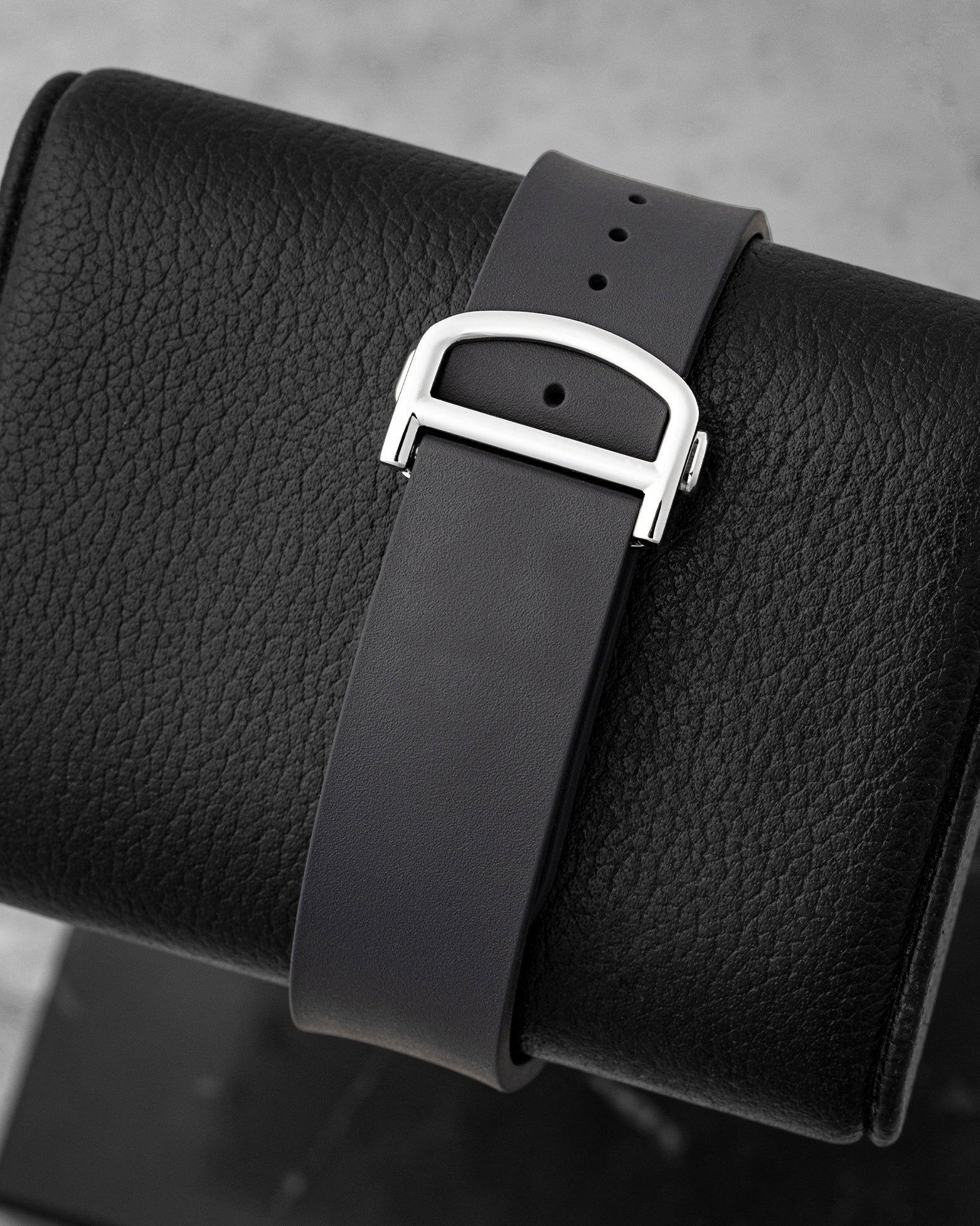 Black rubber strap with screw accent details and black ADLC steel folding deployant clasp for Cartier Santos WSSA0039