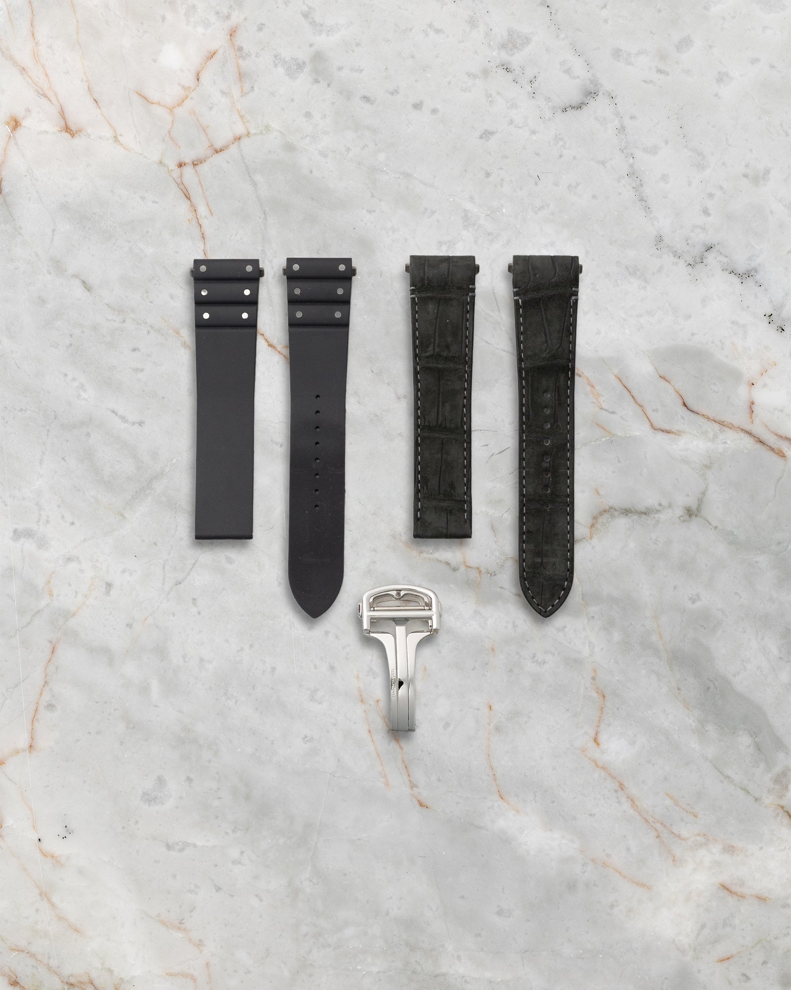 Included QuickSwitch black leather strap and steel deployant buckle for Cartier Santos WSSA0096