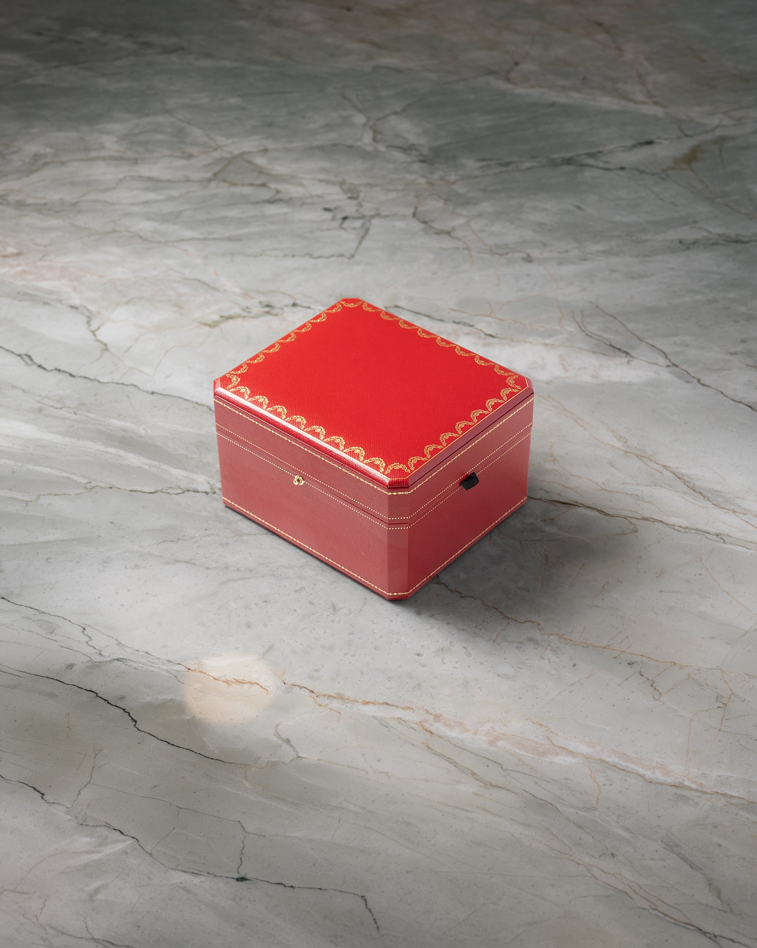 Signature red Cartier presentation box for 2026 Cartier Santos WSSA0096 at Noah's Fine Watches & Jewelry