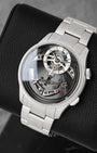 front view of Christopher Ward C1 Bel Canto Nero showing the openwork dial, chiming hammer mechanism, and titanium bracelet