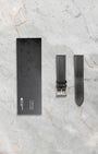 Extra black leather strap and accessory sleeve included with Christopher Ward C1 Bel Canto Nero watch set